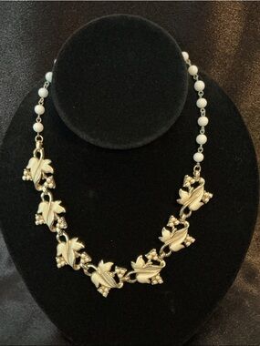 Vintage Celluloid Coro Leaf and Bed Design